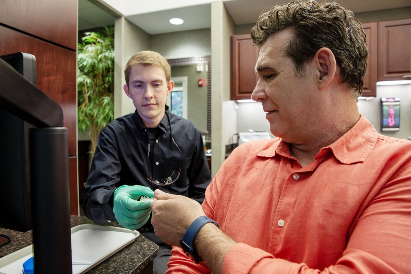 orthodontist with patient