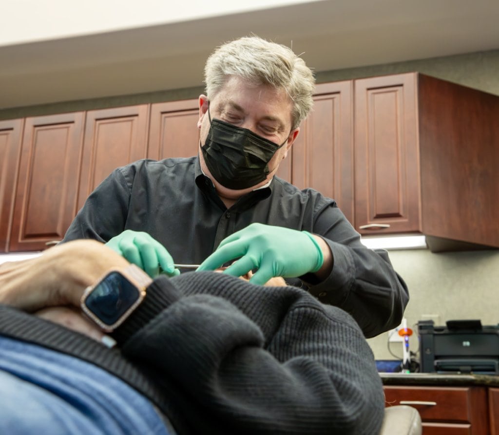 orthodontist with patient